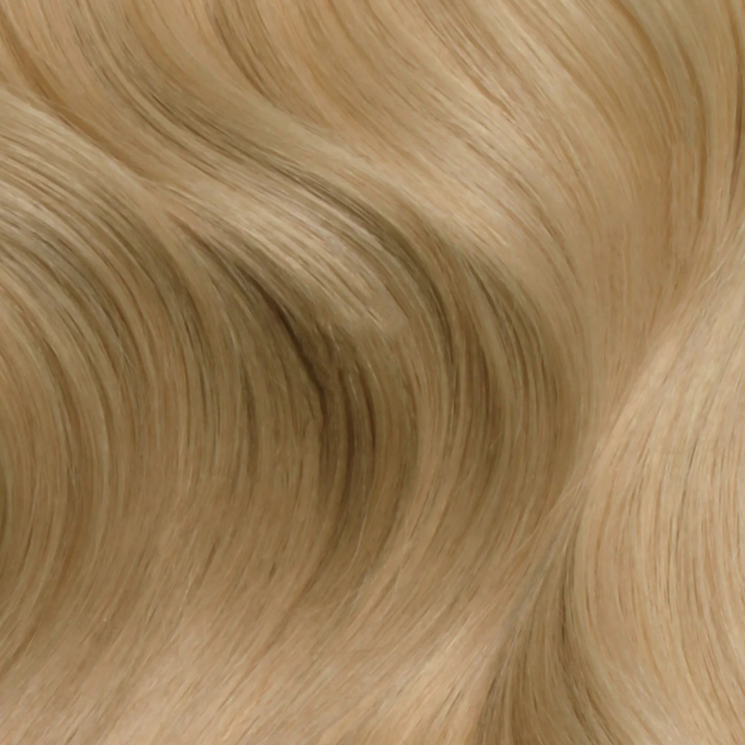 Extra Hair Extension Piece - Barley Bronde #10 showing smooth, wavy, natural-looking hair strands in warm blonde shade.