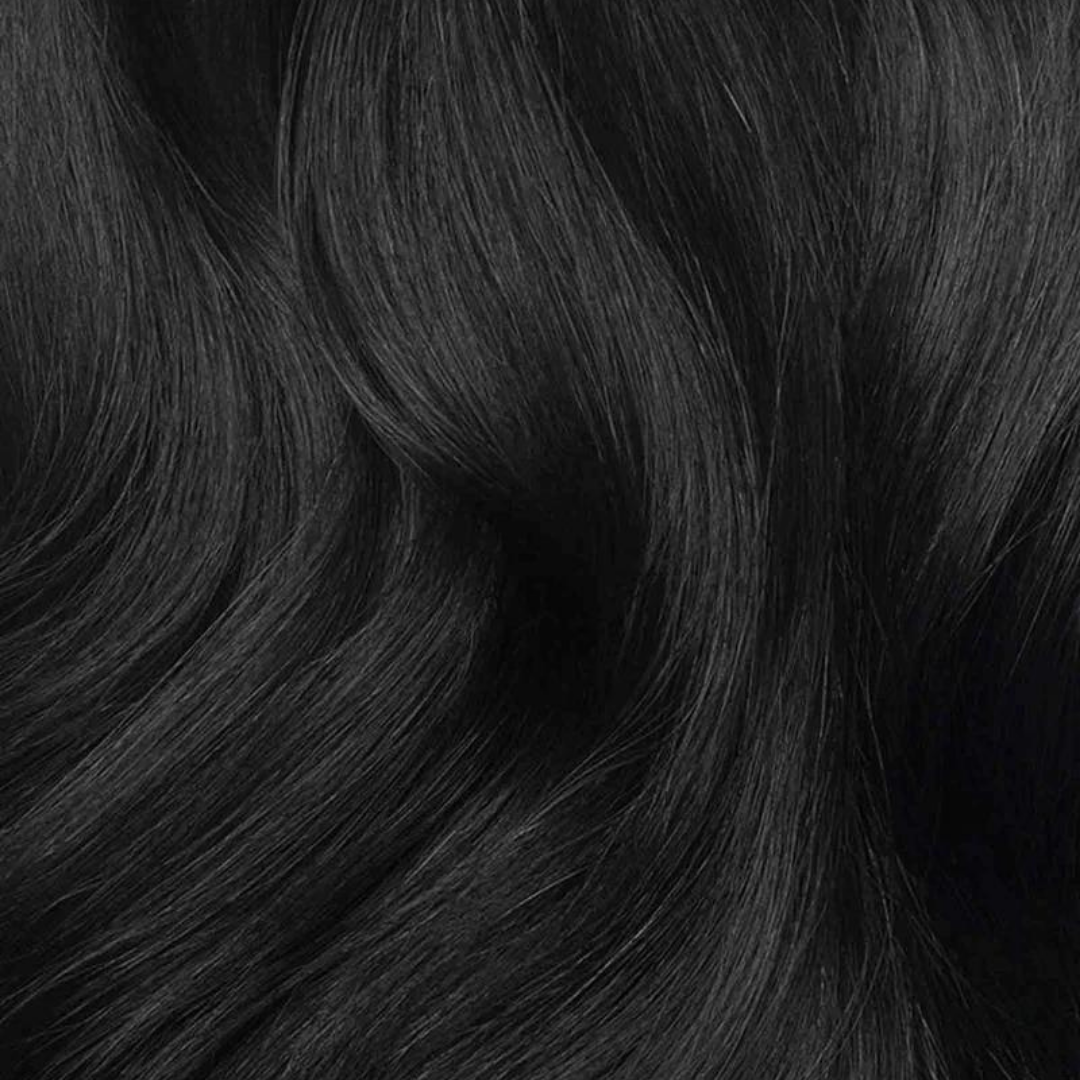 Smooth, shiny strands of jet black hair displaying the richness of Extra Hair Extension Piece - Jet Black 
