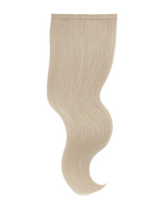 Extra Piece Medium Ash Blonde 24A hair extension weft with smooth, silky texture and natural wave pattern for seamless blend.