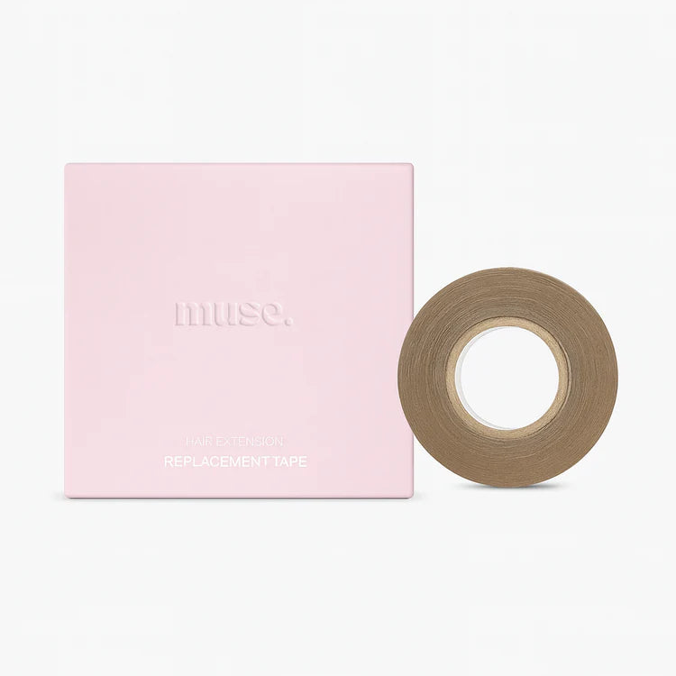 Light brown roll of replacement tape next to a pink square box with subtle Muse branding on a white background