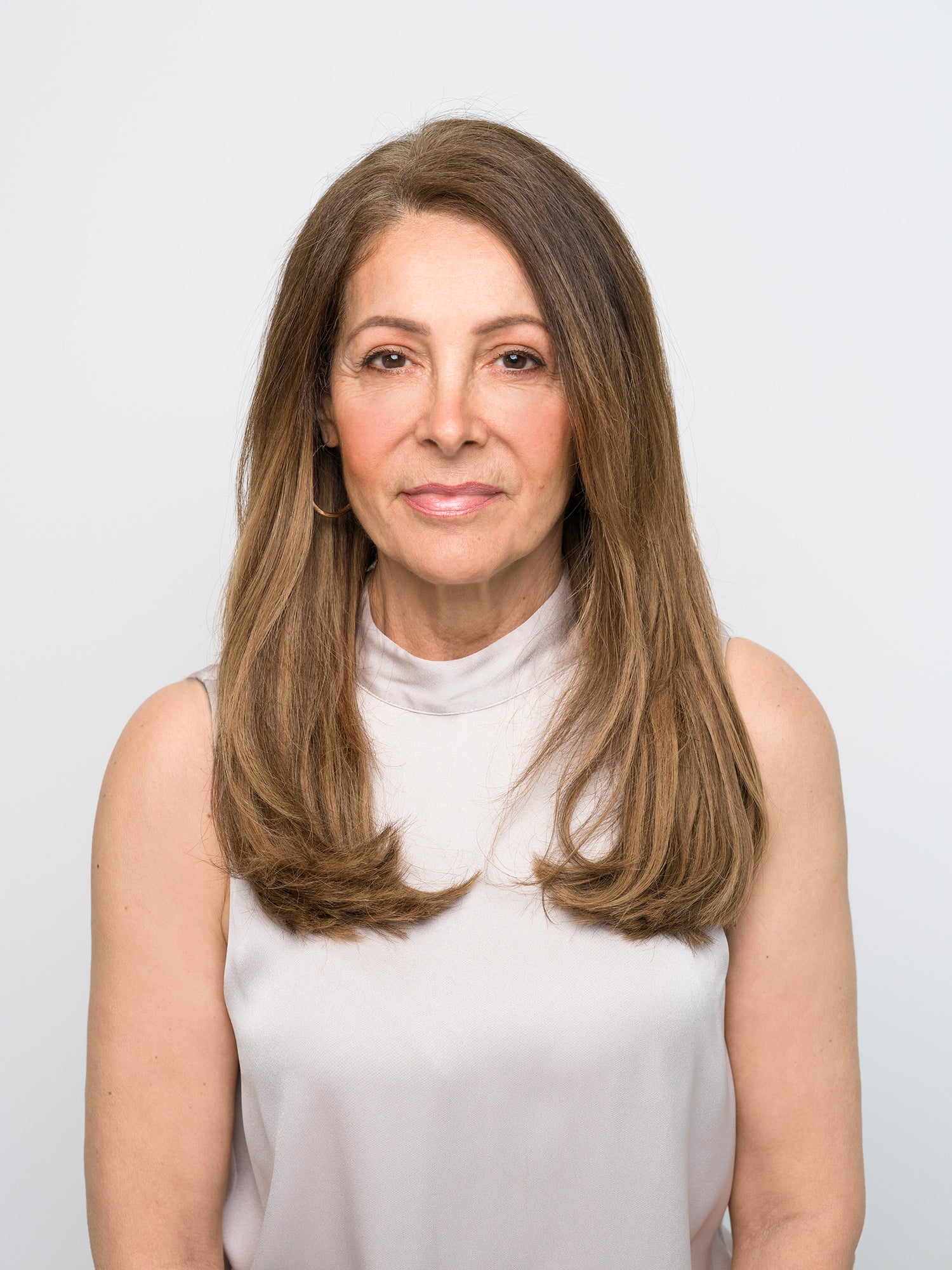 Woman with smooth medium brown hair showcasing the Extra Hair Extension Piece - 