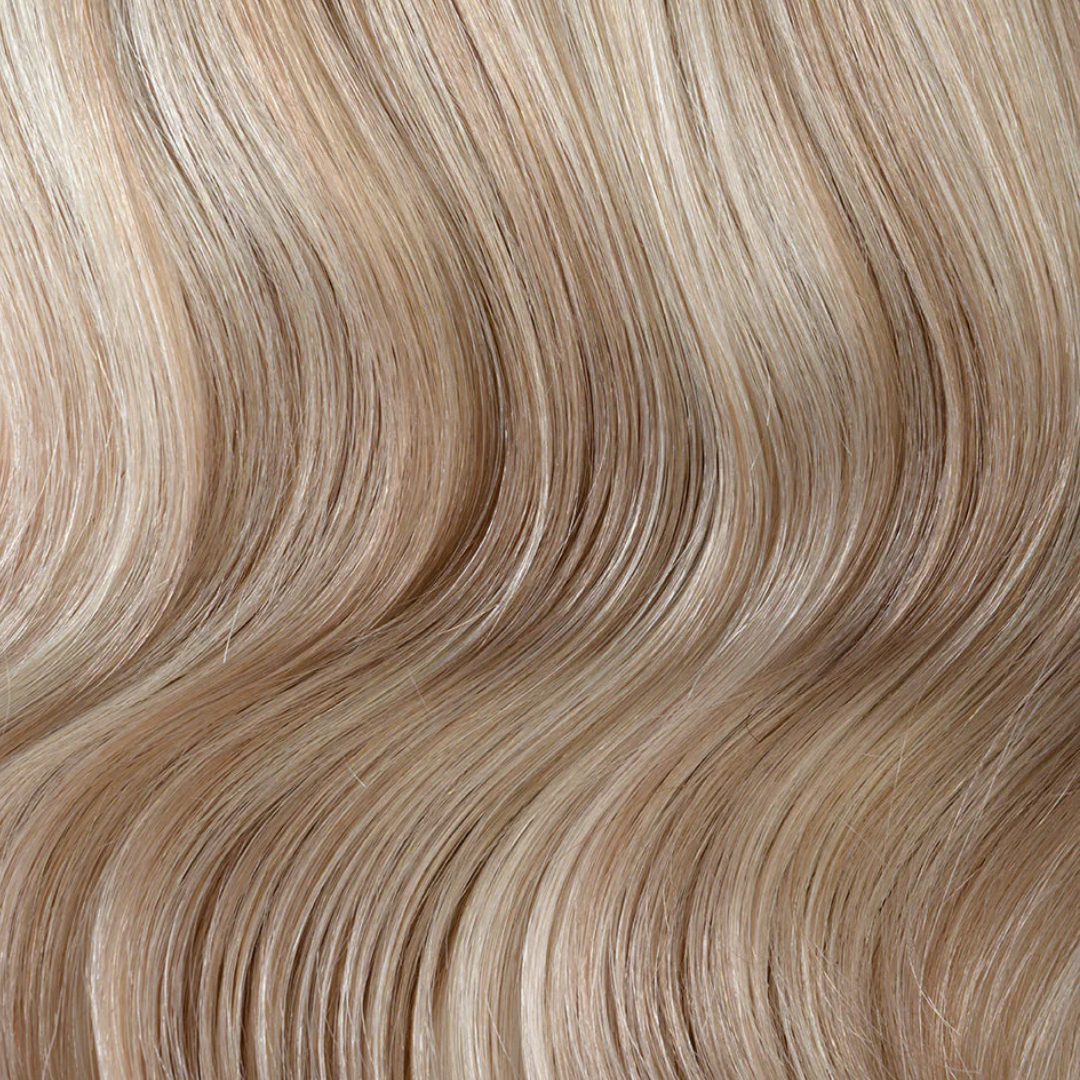 Extra Piece - Sunkissed #P18/60 showing silky smooth light blonde hair with subtle warm highlights and soft waves
