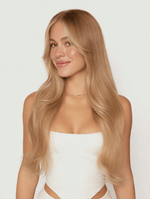Woman with long, smooth, barley blonde hair wearing Barley Bronde 