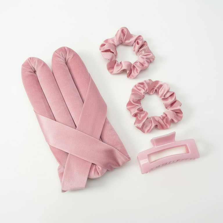 Ultra Soft Heatless Curls Kit with pink velvet curlers, matching scrunchies, and a hair claw clip for gentle styling.